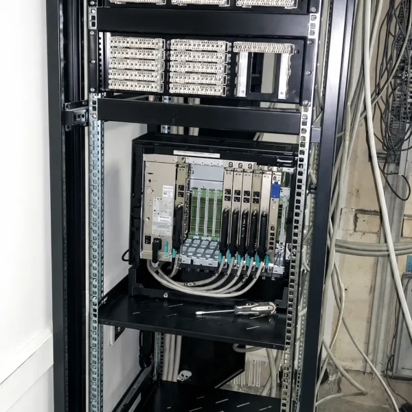 A tall black metal server network rack cabinet in result 1 600x600